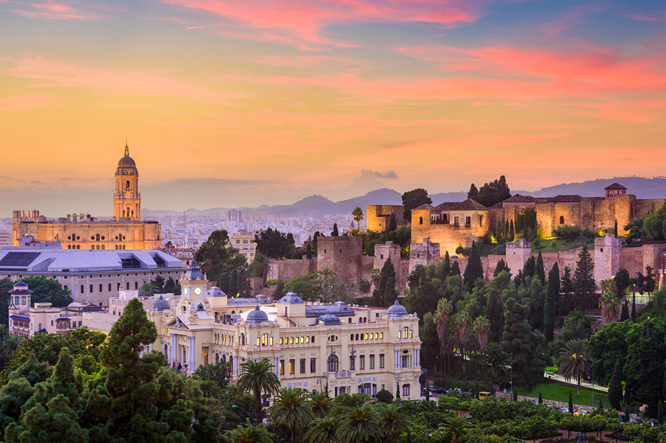 Malaga sunset view with Railbookers. Malaga is a vibrant, culturally rich city that is a far cry from the stereotypical city found along the Costa del Sol. Come visit Malaga with Railbookers!
