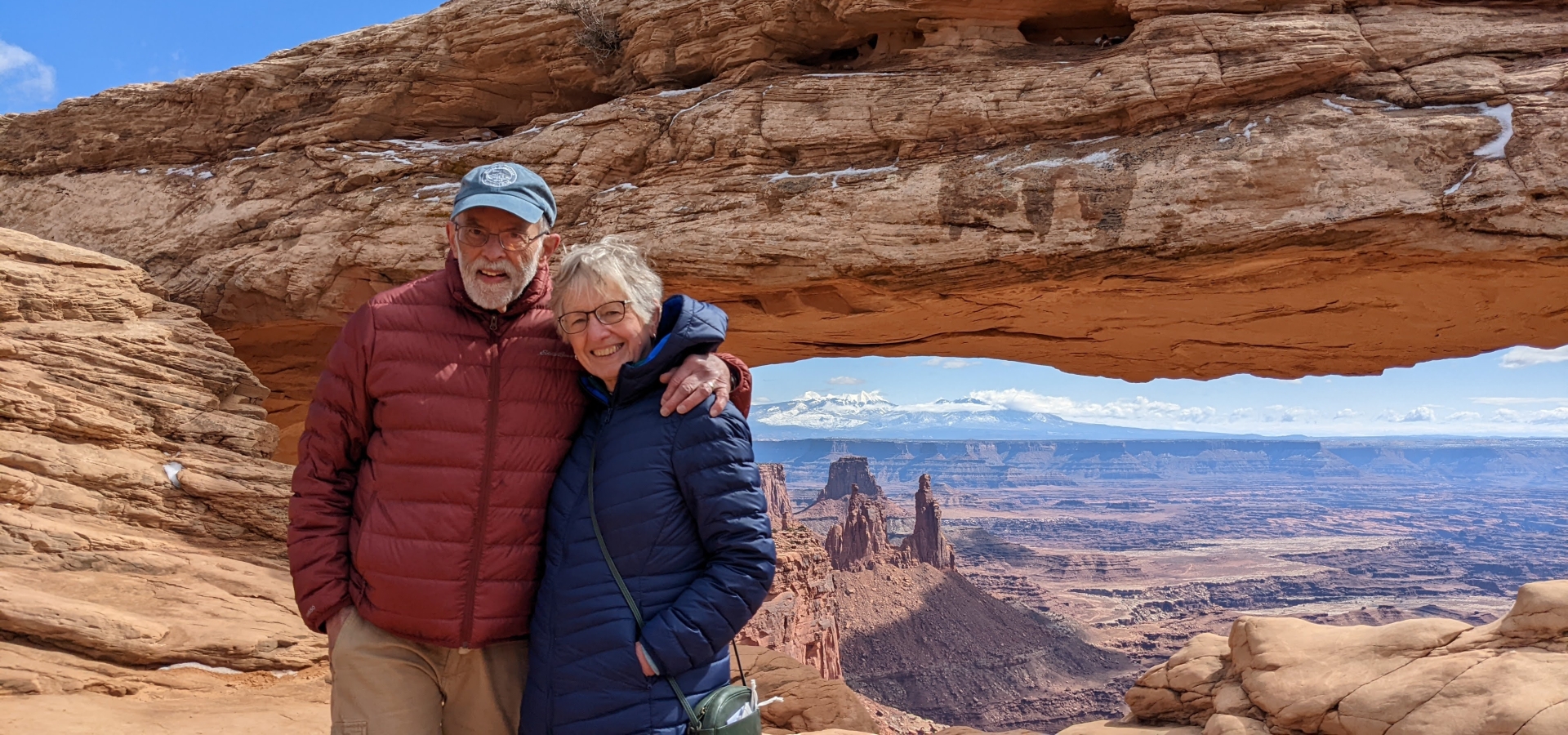 Couple at Canyonlands Mesa Arch National Park