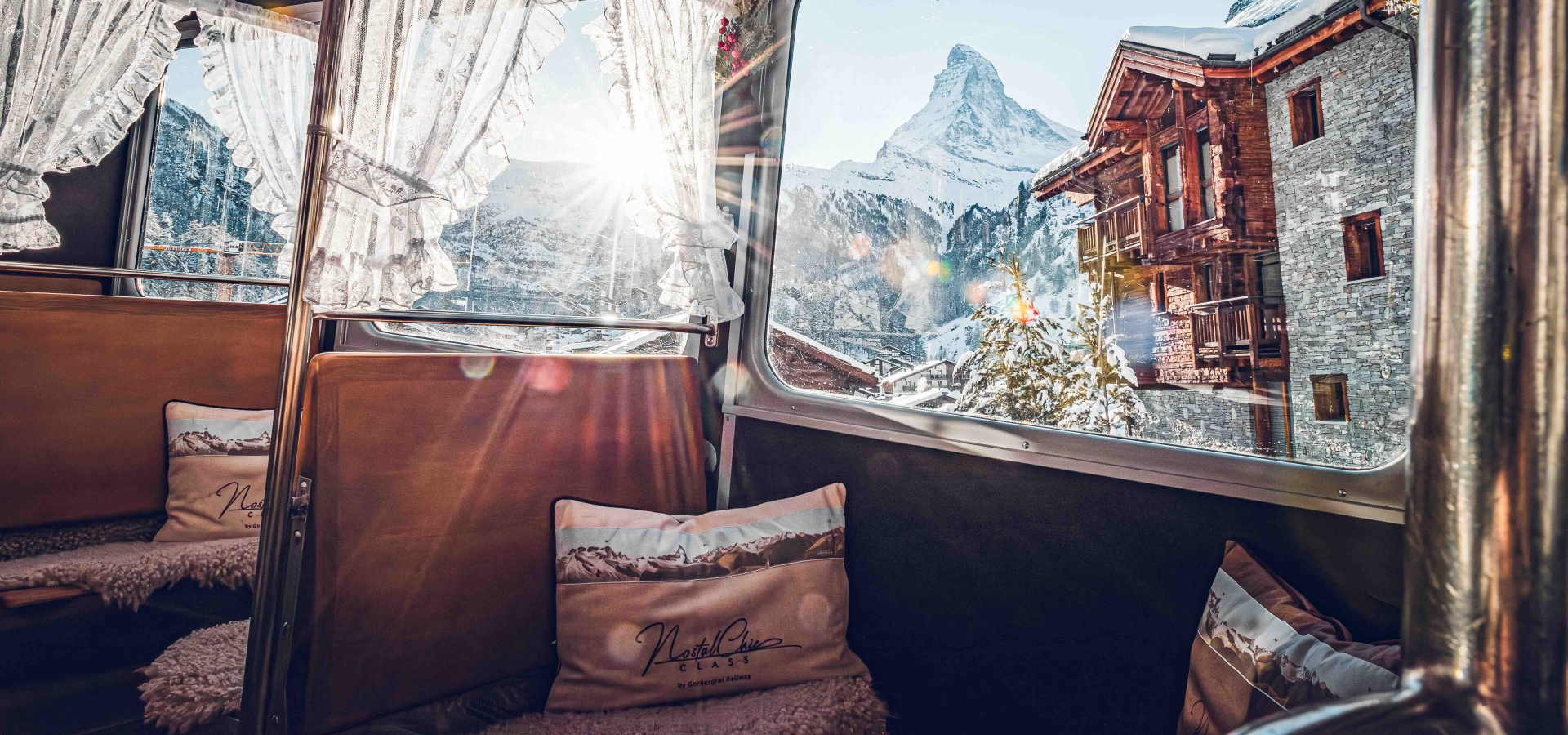 view out the window of nostalchic class onboard the gornergrat 