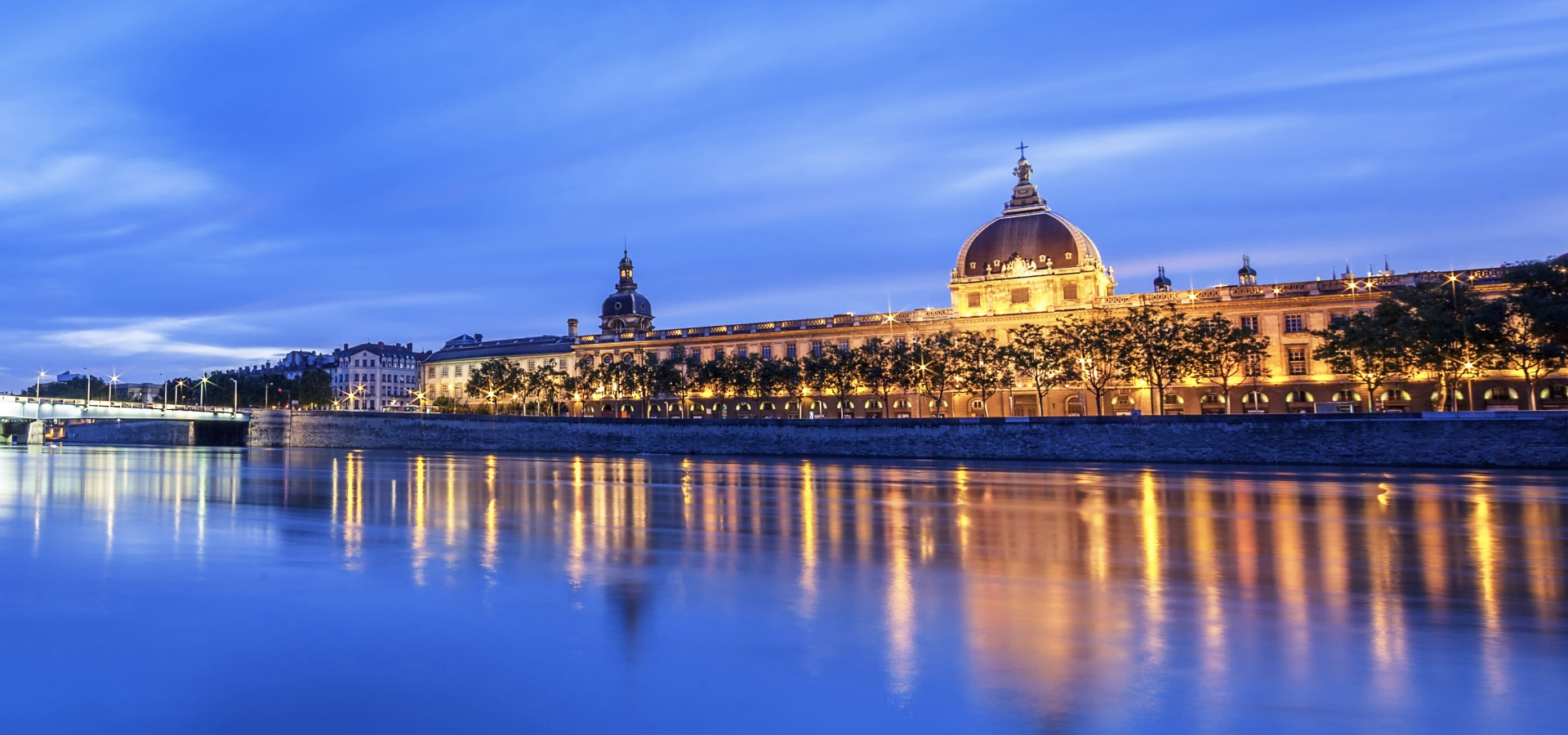 View of Rhone river in Lyon at night, France